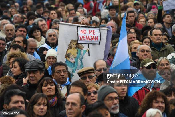 People demonstrate against the government of President Mauricio Macri and the latest deal with the International Monetary Fund, during the 202th...