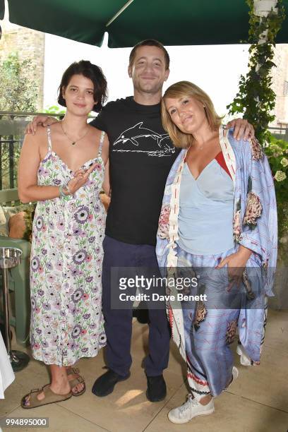 Pixie Geldof, Tyrone Wood and Mika Simmons attend the Project Zero and For Good Causes charity dinner at The Ivy Kensington Brasserie on July 9, 2018...