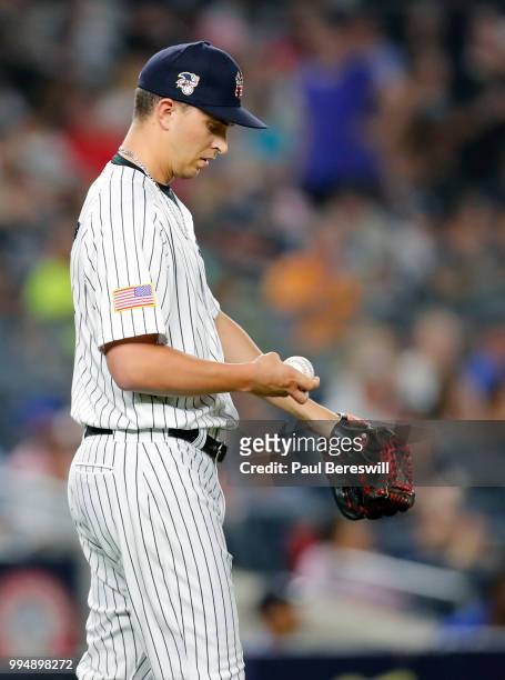 Pitcher A.J. Cole of the New York Yankees reacts in an interleague MLB baseball game against the Atlanta Braves on July 3, 2018 at Yankee Stadium in...