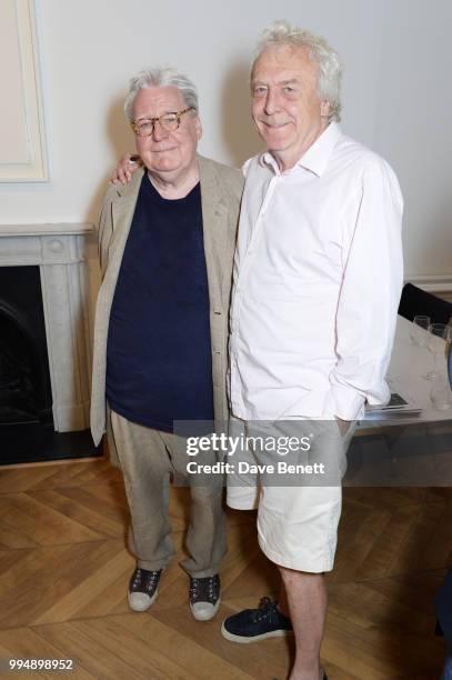 Sir Alan Parker and Roland Cowan attend the Bansky 'Greatest Hits 2002-2008" exhibition VIP preview at Lazinc on July 9, 2018 in London, England.