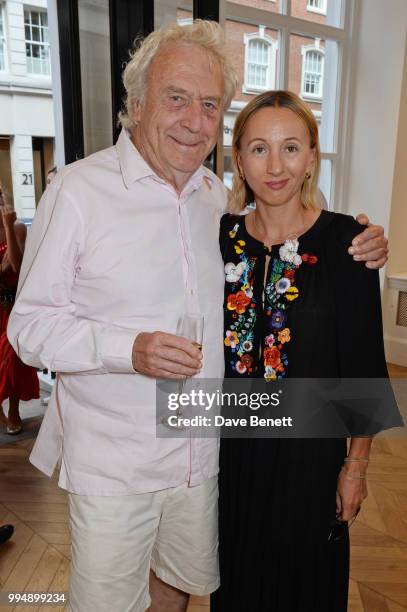 Roland Cowan and wife Jane Cowan attend the Bansky 'Greatest Hits 2002-2008" exhibition VIP preview at Lazinc on July 9, 2018 in London, England.