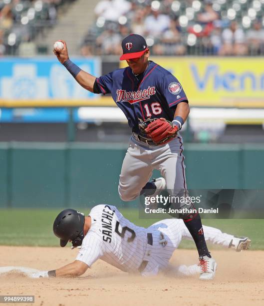 Yolmer Sanchez of the Chicago White Sox breaks up a double play by Ehire Adrianza of the Minnesota Twins in the 7th inning at Guaranteed Rate Field...