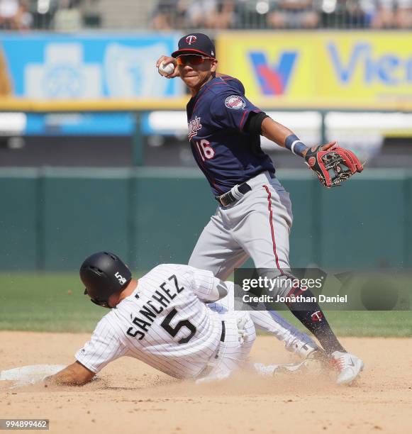 Yolmer Sanchez of the Chicago White Sox breaks up a double play by Ehire Adrianza of the Minnesota Twins in the 7th inning at Guaranteed Rate Field...