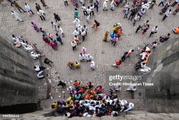 People from Warkari community visited Shaniwar Wada as the Paalkhi procession halts for one day in Pune on July 8, 2018 in Pune, India. Wari is an...
