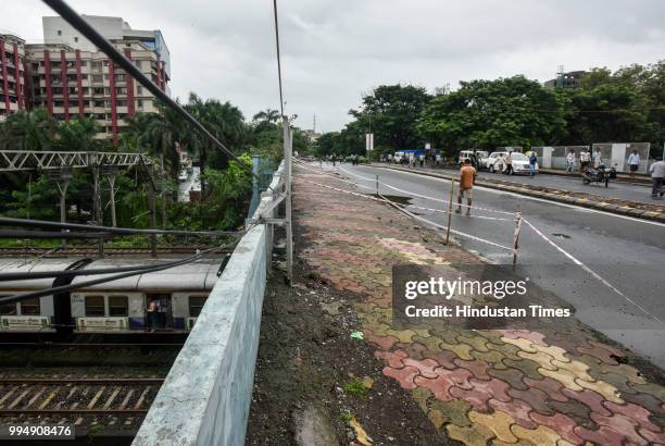 Ghatkopar rail overbridge was closed for vehicular traffic on July 8, 2018 in Mumbai, India. The footpath along a bridge in Ghatkopar has been shut,...