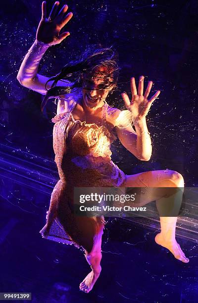 An actress rehearses for the argentine show "Fuerza Bruta" at Carpa Santa Fe on May 14, 2010 in Mexico City, Mexico.