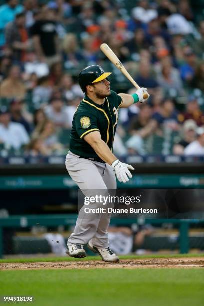 Josh Phegley of the Oakland Athletics watches his fly ball during a game against the Detroit Tigers at Comerica Park on June 27, 2018 in Detroit,...