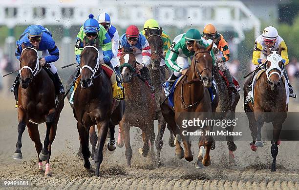 Acting Happy, ridden by Jose Lezcano, races against the pack toward turn 1 during The Black Eyed Susan Stakes at Pimlico Race Course on May 14, 2010...