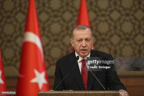 Turkey's President Tayyip Erdogan announces the new ministers of his cabinet during a press conference at the Presidential Palace on July 9, 2018 in...
