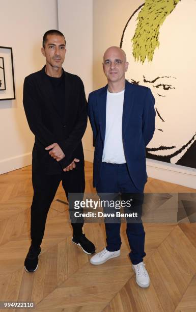 Wissam Al Mana and Steve Lazarides attend the Bansky 'Greatest Hits 2002-2008" exhibition VIP preview at Lazinc on July 9, 2018 in London, England.