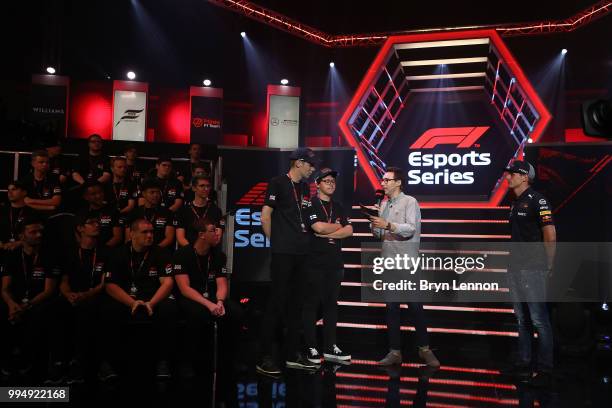 Red Bull Racing esports Draft picks Joni Tormala and Graham Carroll talk on stage with Red Bull Racing's Max Verstappen during the F1 eSports Pro...