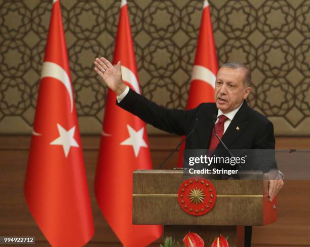 Turkey's President Tayyip Erdogan announces the new ministers of his cabinet during a press conference at the Presidential Palace on July 9, 2018 in...