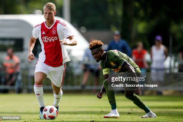 Mitchel Bakker of Ajax, Godsway Donyoh of FC Nordsj¾lland during the Club Friendly match between Ajax v FC Nordsjaelland at the Sportpark Putter Eng...