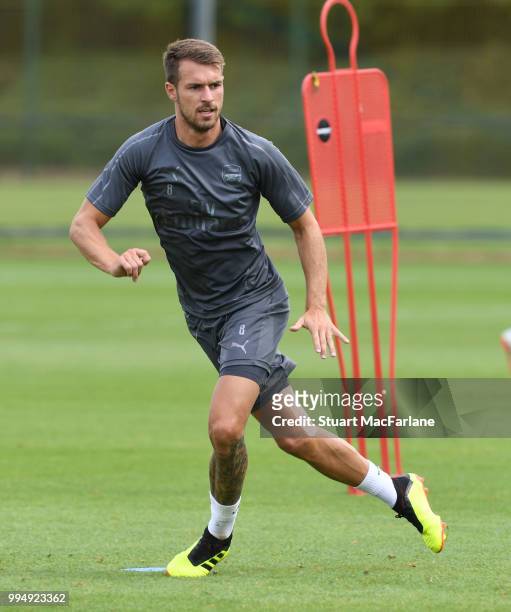 Aaron Ramsey of Arsenal runs during a training session at Colney on July 9, 2018 in St Albans, England.
