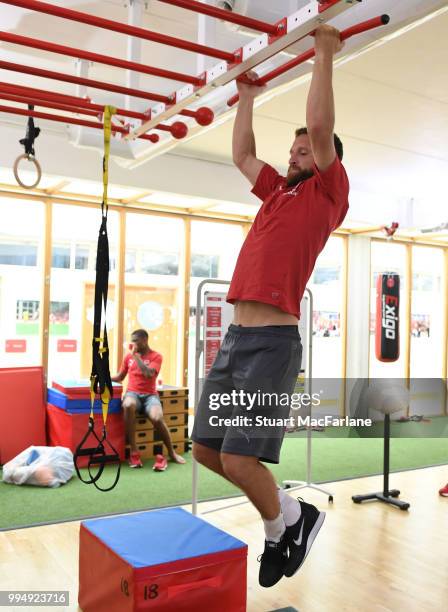 Shkodran Mustafi of Arsenal looks on during a training session at Colney on July 9, 2018 in St Albans, England.