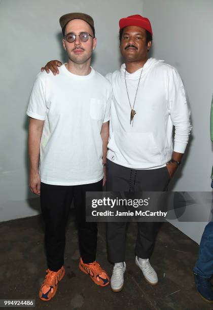 Mick poses with DNYE designer Christopher Bevans the DYNE SS19 NYFWM's Presentation at Industria Studios on July 9, 2018 in New York City.