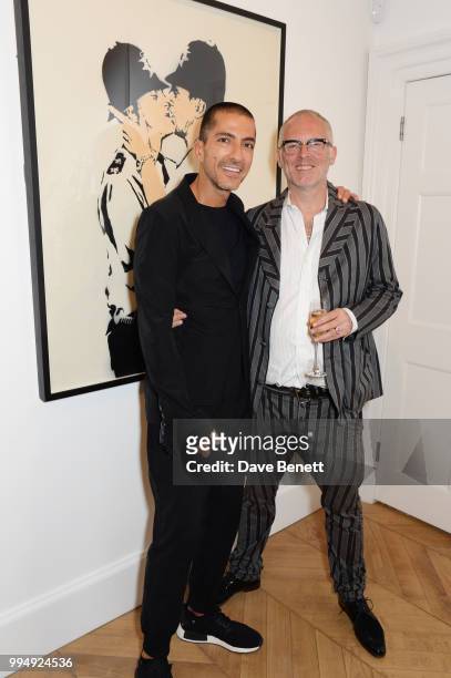 Wissam Al Mana and Joe Corre attend the Bansky 'Greatest Hits 2002-2008" exhibition VIP preview at Lazinc on July 9, 2018 in London, England.