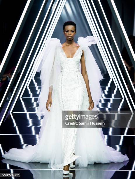 Maria Borges walks the runway during the Ralph & Russo Haute Couture Fall/Winter 2018-2019 show as part of Haute Couture Paris Fashion Week on July...