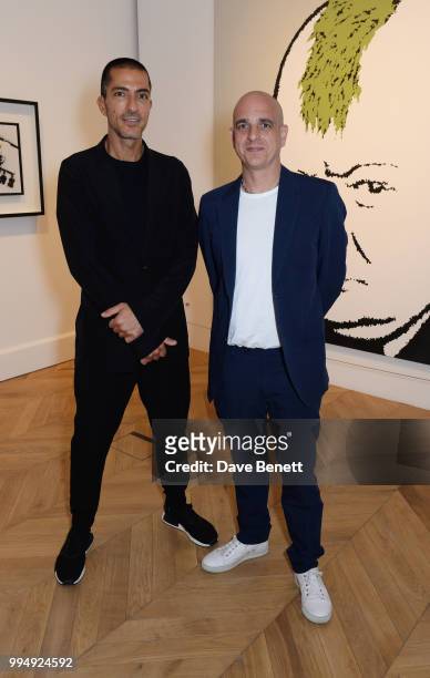 Wissam Al Mana and Steve Lazarides attend the Bansky 'Greatest Hits 2002-2008" exhibition VIP preview at Lazinc on July 9, 2018 in London, England.