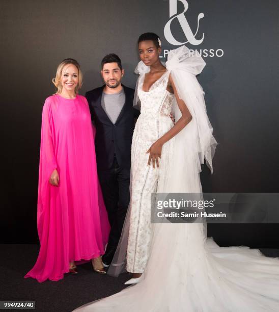 Maria Borges poses with designers Tamara Ralph and Michael Russo at the Ralph & Russo Haute Couture Fall/Winter 2018-2019 show as part of Haute...