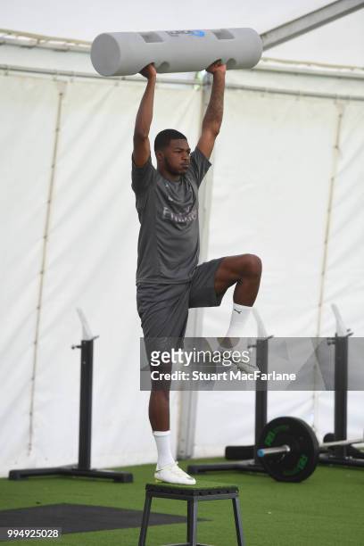 Ainsley Maitland-Niles of Arsenal warms up during a training session at London Colney on July 9, 2018 in St Albans, England.