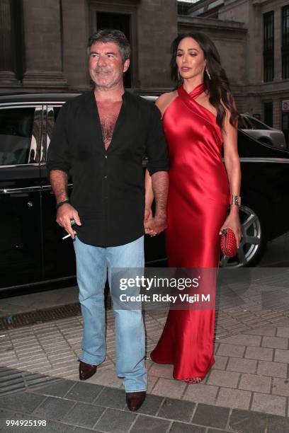 Simon Cowell and Lauren Silverman seen attending Syco - summer party at Victoria and Albert Museum on July 9, 2018 in London, England.