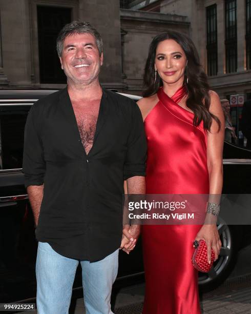 Simon Cowell and Lauren Silverman seen attending Syco - summer party at Victoria and Albert Museum on July 9, 2018 in London, England.