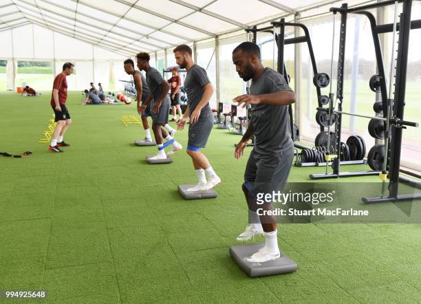 Alex Lacazette of Arsenal warms up during a training session at London Colney on July 9, 2018 in St Albans, England.