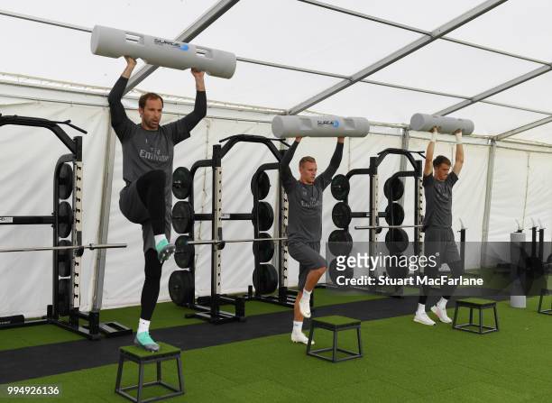 Petr Cech, Bernd Leno and Matt Macey of Arsenal warm up during a training session at London Colney on July 9, 2018 in St Albans, England.