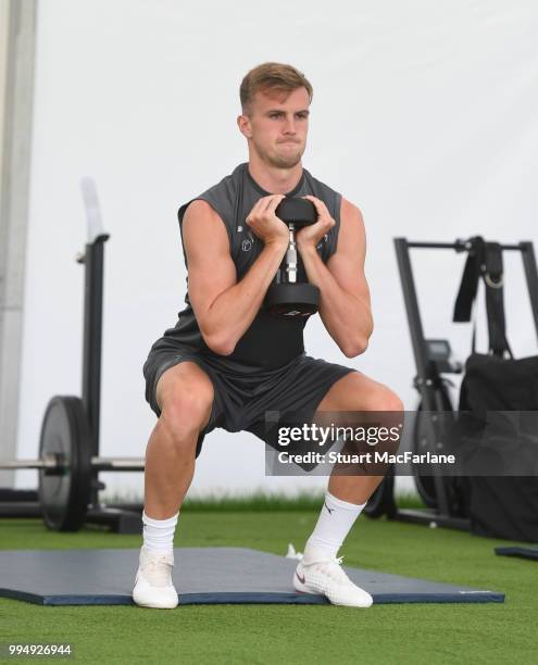 Rob Holding of Arsenal warms up during a training session at London Colney on July 9, 2018 in St Albans, England.