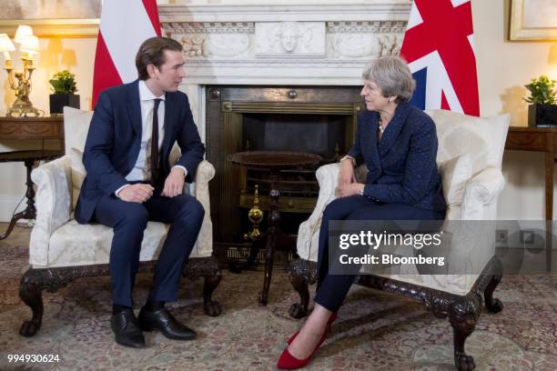 Sebastian Kurz, Austria's chancellor, speaks while Theresa May, U.K. Prime minister, right, listens during a bilateral meeting inside number 10...