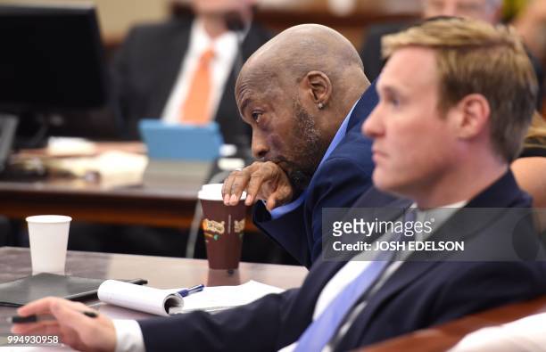 Plaintiff Dewayne Johnson reacts while attorney Brent Wisner speaks about his condition during the Monsanto trial in San Francisco, California on...