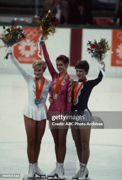 Sarajevo, Bosnia-Herzegovina Rosalynn Sumners, Katarina Witt, Kira Ivanova in the Ladies' figure skating medal ceremony at the 1984 Winter Olympics /...