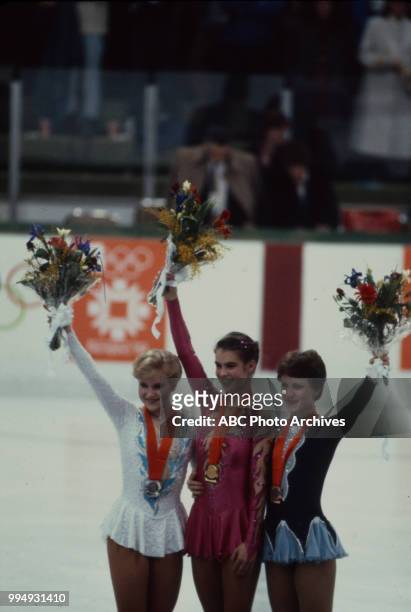 Sarajevo, Bosnia-Herzegovina Rosalynn Sumners, Katarina Witt, Kira Ivanova in the Ladies' figure skating medal ceremony at the 1984 Winter Olympics /...