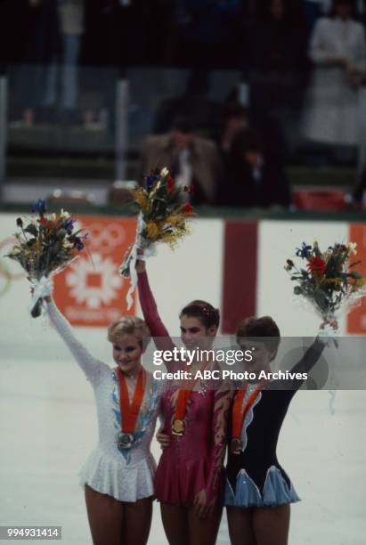 Sarajevo, Bosnia-Herzegovina Rosalynn Sumners, Katarina Witt, Kira Ivanova in the Ladies' figure skating medal ceremony at the 1984 Winter Olympics /...