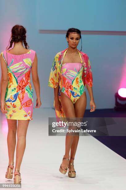 Models present swimwear creation at the International Exhibition of Lingerie, 'Salon De La Lingerie' Summer Collection at Parc des Expositions Porte...