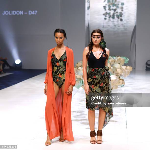 Models present swimwear creation at the International Exhibition of Lingerie, 'Salon De La Lingerie' Summer Collection at Parc des Expositions Porte...