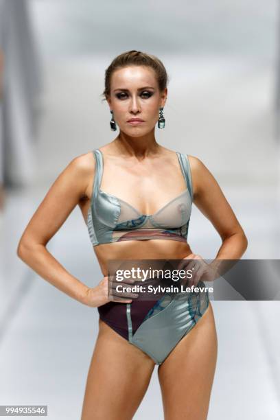 Model presents underwear creation at the International Exhibition of Lingerie, 'Salon De La Lingerie' Summer Collection at Parc des Expositions Porte...