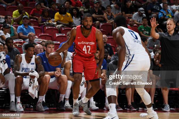 Aaron Harrison of the Washington Wizards handles the ball against the Philadelphia 76ers during the 2018 Las Vegas Summer League on July 9, 2018 at...
