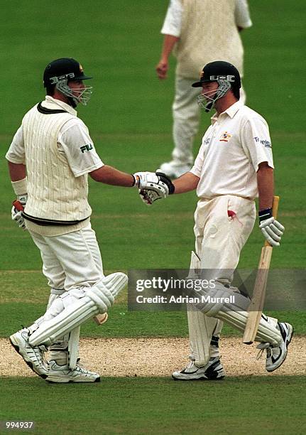 Mark Waugh of Australia is congratulated on his hundred by brother Steve Waugh during the second day of the Second Npower Test between Engalnd and...