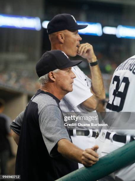 Pitching coach Rick Anderson of the Detroit Tigers, front, with bench coach Steve Liddle of the Detroit Tigers during a game against the Oakland...