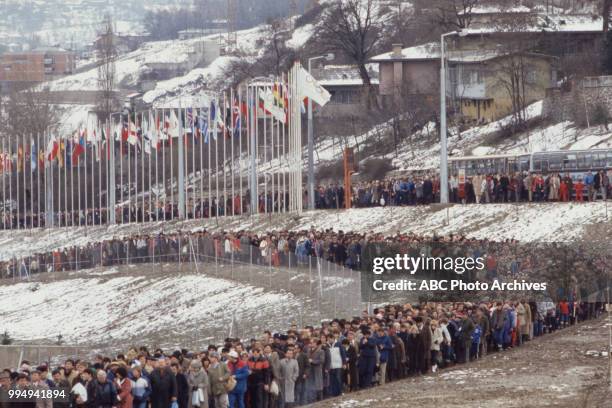 Sarajevo, Bosnia-Herzegovina People waiting in line at the opening ceremonies at the 1984 Winter Olympics / XIV Olympic Winter Games, Kosevo Stadium.