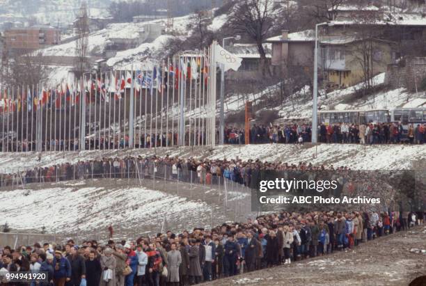 Sarajevo, Bosnia-Herzegovina People waiting in line at the opening ceremonies at the 1984 Winter Olympics / XIV Olympic Winter Games, Kosevo Stadium.