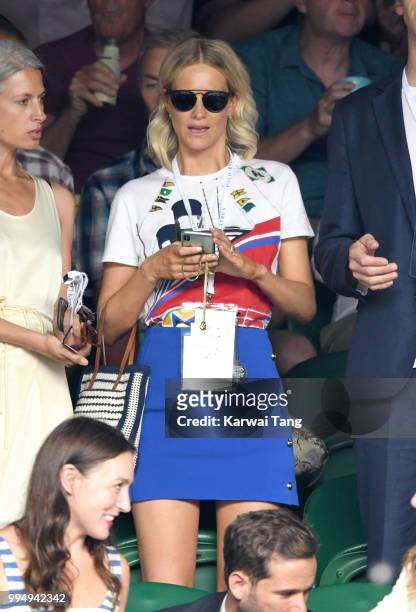 Poppy Delevingne attends day seven of the Wimbledon Tennis Championships at the All England Lawn Tennis and Croquet Club on July 9, 2018 in London,...