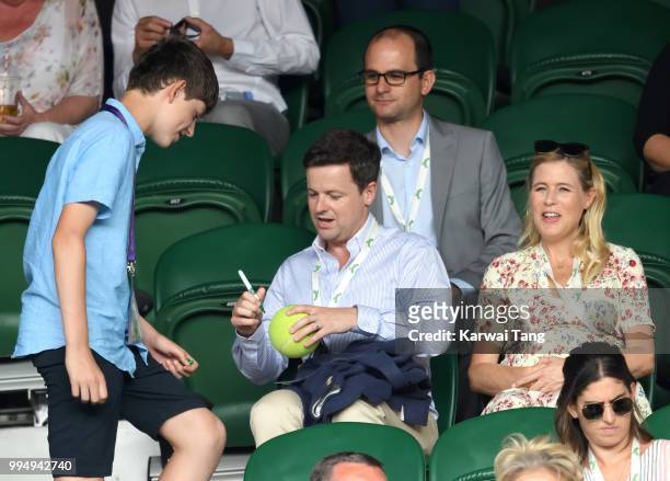Declan Donnelly and Ali Astall attend day seven of the Wimbledon Tennis Championships at the All England Lawn Tennis and Croquet Club on July 9, 2018...