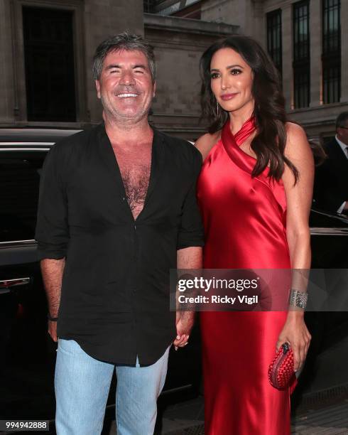 Simon Cowell and Lauren Silverman seen attending Syco - summer party at Victoria and Albert Museum on July 9, 2018 in London, England.