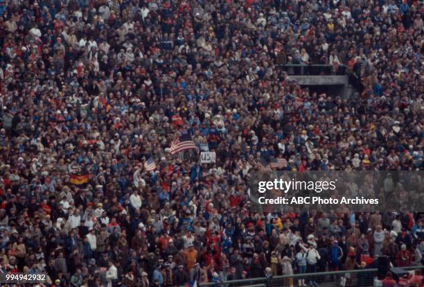 Sarajevo, Bosnia-Herzegovina Fans in stands at the opening ceremonies at the 1984 Winter Olympics / XIV Olympic Winter Games, Kosevo Stadium.