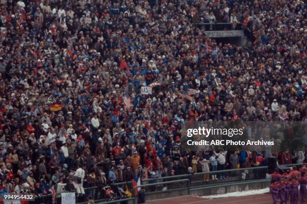 Sarajevo, Bosnia-Herzegovina Fans in the stands at the opening ceremonies at the 1984 Winter Olympics / XIV Olympic Winter Games, Kosevo Stadium.