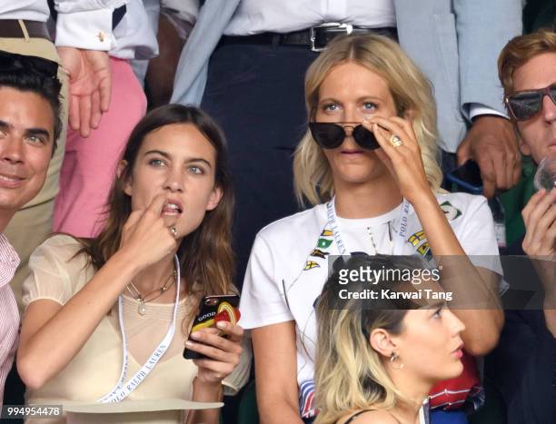Alexa Chung and Poppy Delevingne attend day seven of the Wimbledon Tennis Championships at the All England Lawn Tennis and Croquet Club on July 9,...