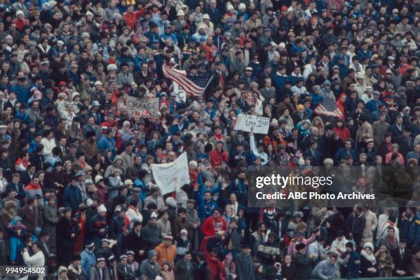 Sarajevo, Bosnia-Herzegovina Fans in the stands at the opening ceremonies at the 1984 Winter Olympics / XIV Olympic Winter Games, Kosevo Stadium.